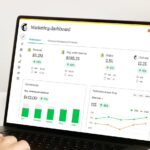 An open laptop that’s on a marketing dashboard screen