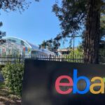 An eBay sign in front of the eBay headquarters.