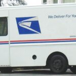 An image of a USPS delivery truck