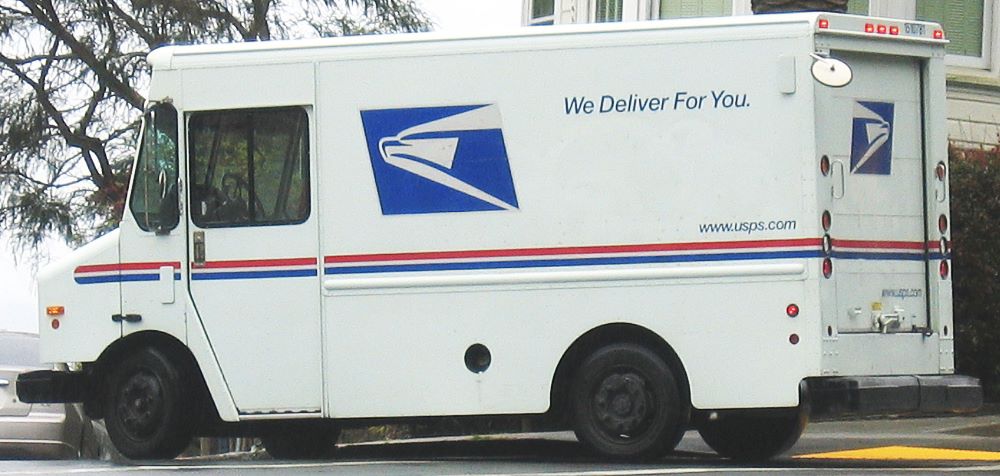 An image of a USPS delivery truck