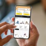 A person shopping on Amazon on their phone