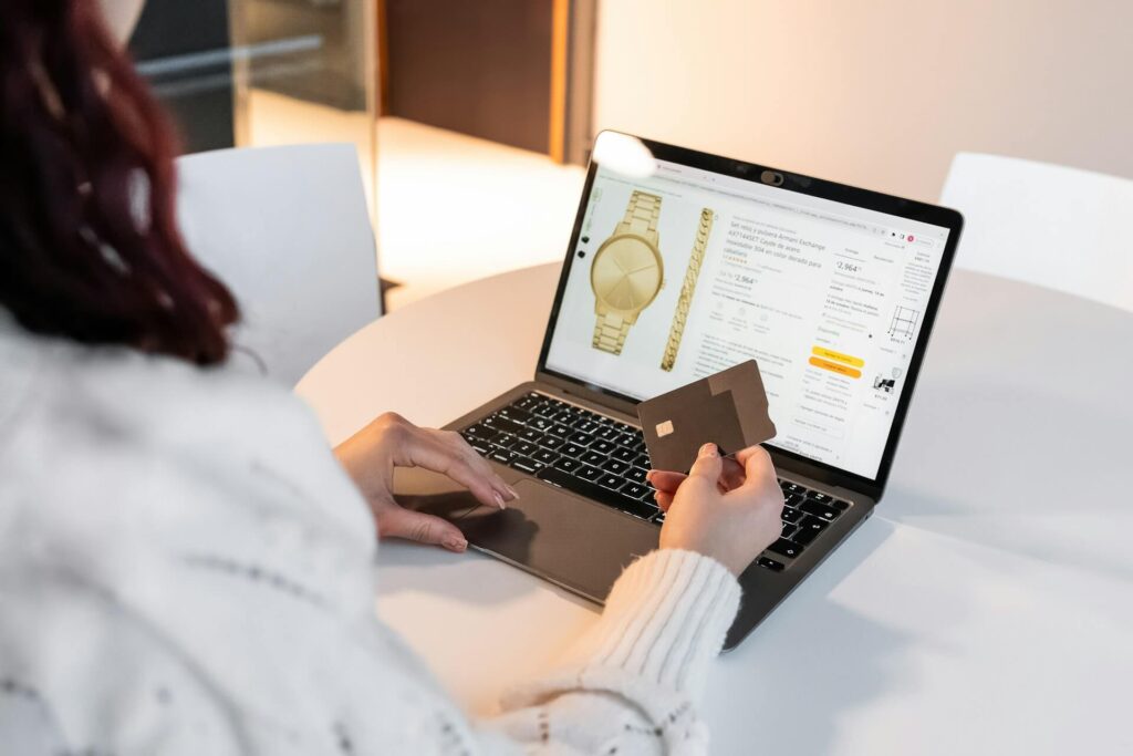 A woman on her laptop buying things online