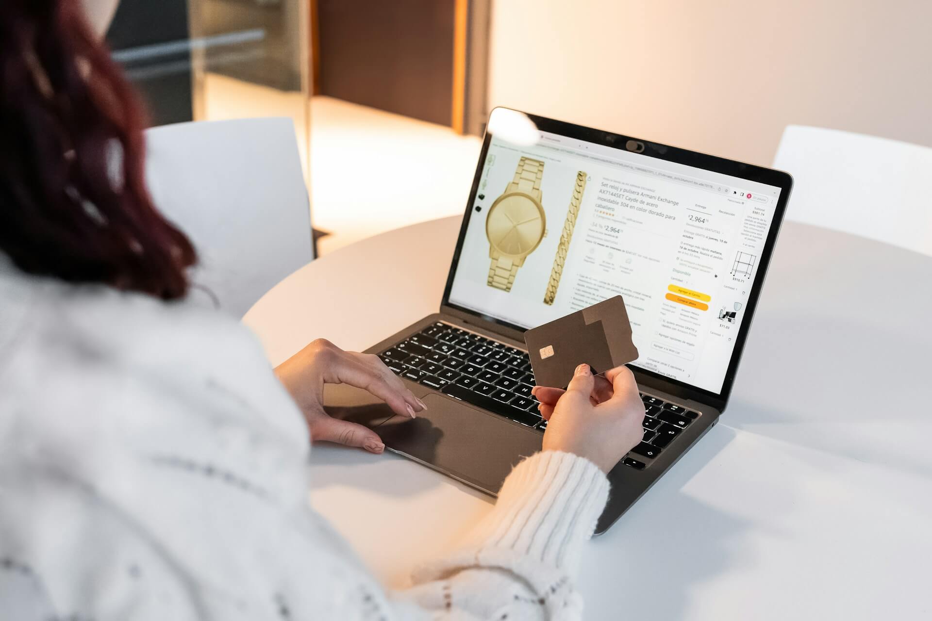 A woman on her laptop buying things online