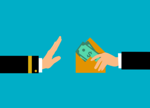 One arm handing money over to another arm.