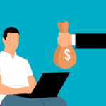 A person giving a bag of money to another person sitting on a chair using a laptop.