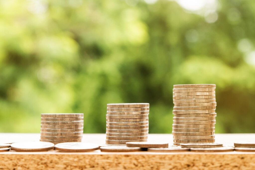 Stacks of coins that each get taller than the previous one.