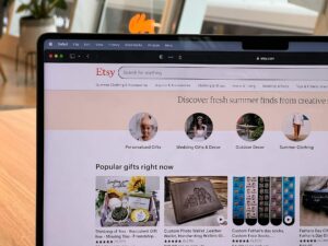 An image of Etsy website on a laptop screen