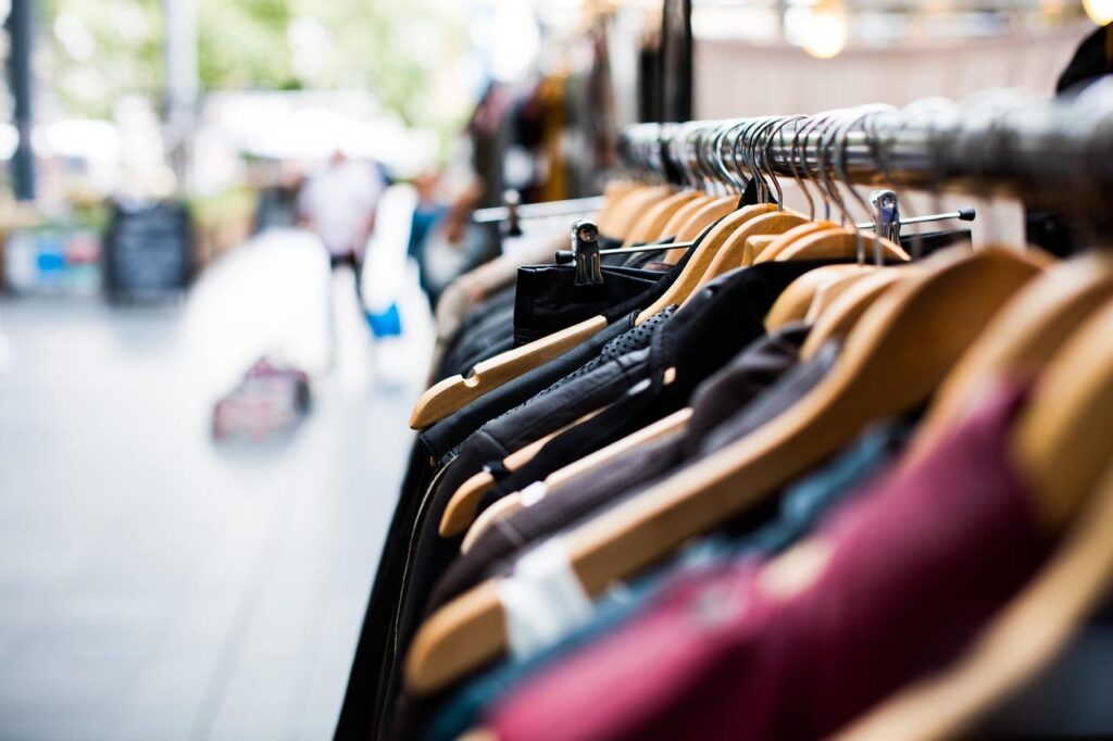 Clothes on hangers at a market