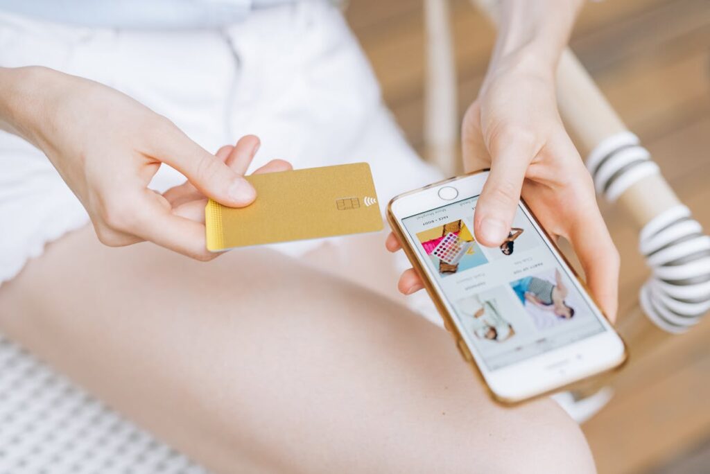An image of a person paying through Google with a Mastercard
