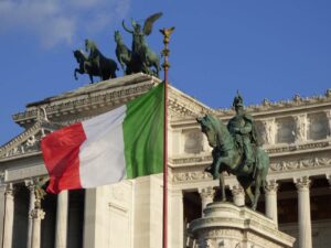 An image of the Italian flag in front of a building