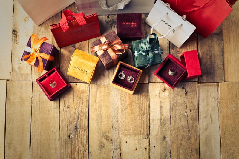 Small gift boxes on a wooden floor