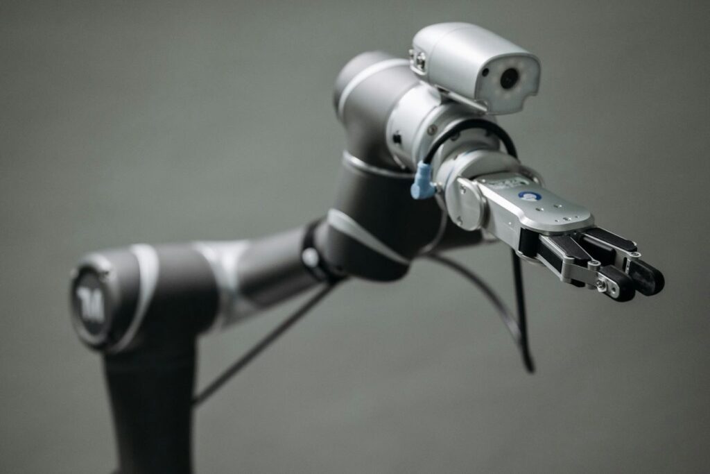 A robotic arm with a camera or sensor on it