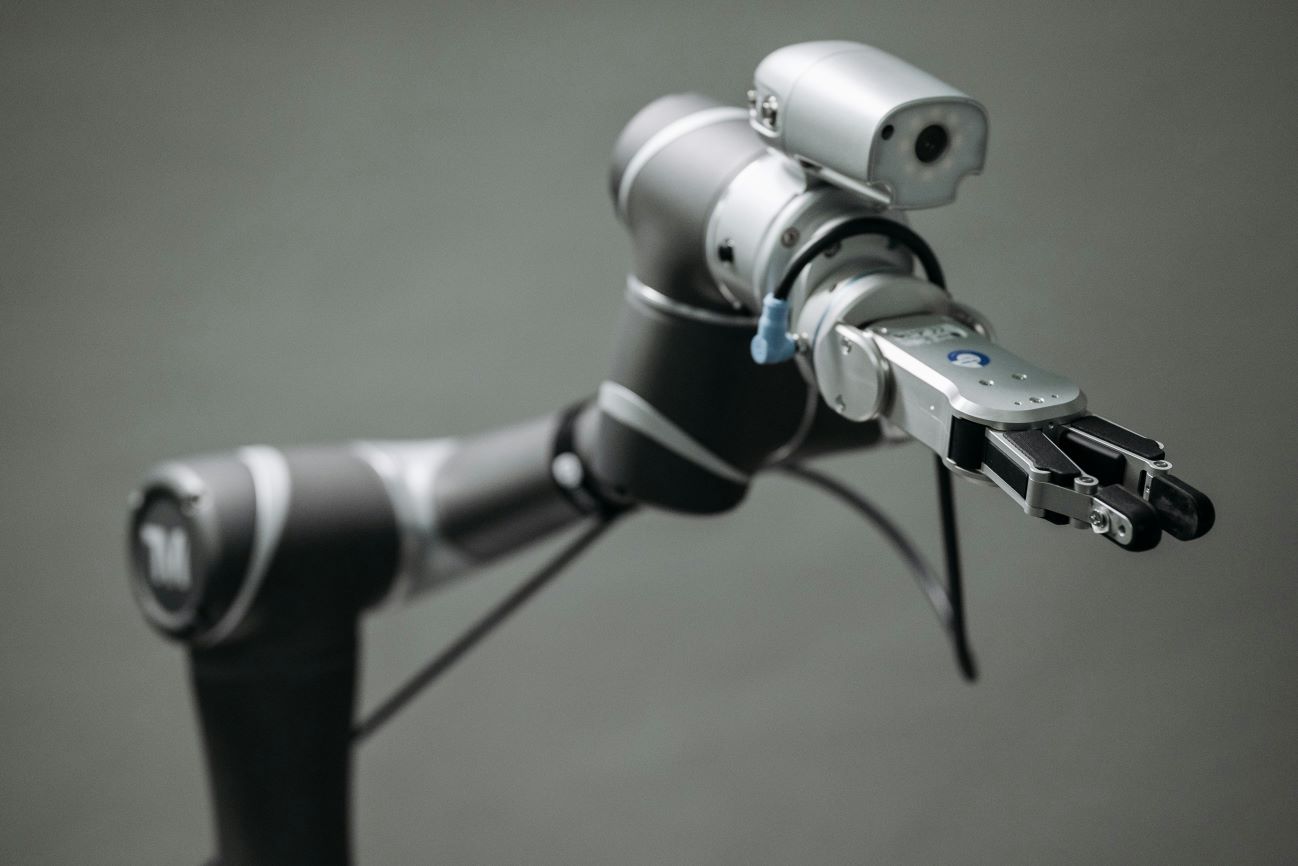 A robotic arm with a camera or sensor on it