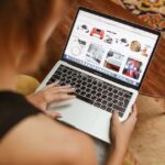 A woman looking at ebay
