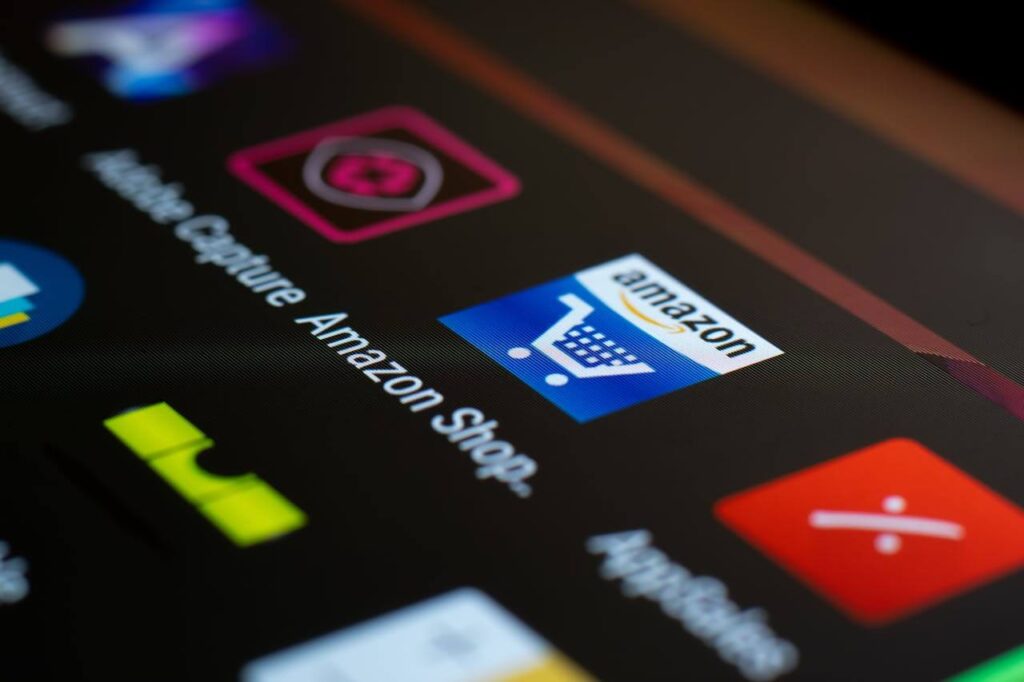 Close-up of the Amazon shopping app icon on a smartphone screen.
