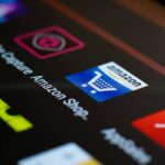 Close-up of the Amazon shopping app icon on a smartphone screen.
