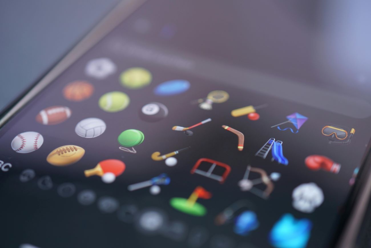 A variety of different emojis on a phone screen