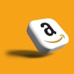 An image of amazon logo on an orange backround