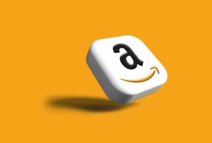 An image of amazon logo on an orange backround