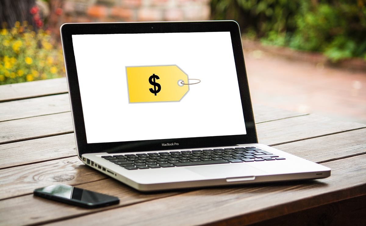 An image of a laptop computer with a price tag on the screen